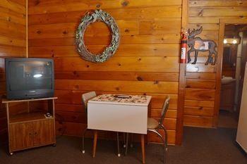 Hôtel Lucky Horseshoe Cabins à Au Sable Extérieur photo